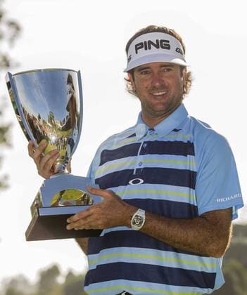 Bubba Watson celebrates with his trophy at the awarding ceremony of the PGA Golf Herren Tour Northern Trust Open golf tournament at Riviera Country Club in Los Angeles, Feb. 16, 2014.(Xinhua Zhao Hanrong) (SP)U.S.-LOS ANGELES-GOLF-PGA-NORTHERN TRUST OPEN 
