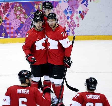 Feb. 16, 2014 - Sochi, Sochi, Russia - Team Canada s Drew Doughty ( 8) celebrates his first period goal against Team Finland with teammates Jeff Carter ( 77), Shea Weber ( 6) and Sidney Crosby ( 87) during their men s ice hockey game at the Bolshoy Ice Dome during the Sochi 2014 Winter Olympics in Sochi, Russia, on Sunday Feb. 16, 2014. Al Charest Calgary Sun QMI Agency OLY2014 Team Canada vs Team Finland at the Sochi 2014 Winter Olympics - ZUMAq06