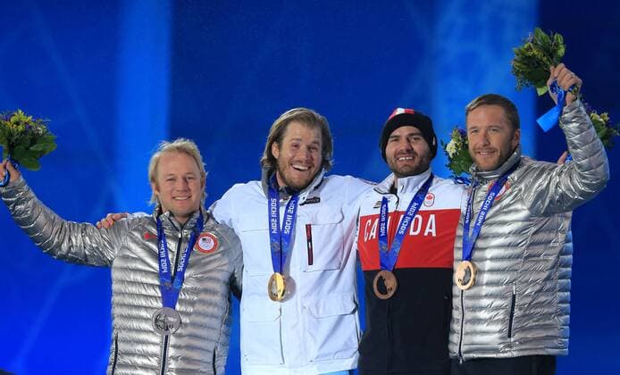 ITAR-TASS: SOCHI, RUSSIA. FEBRUARY 16, 2014. Silver medalist Andrew Weibrecht of USA, gold medalist Kjetil Jansrud of Norway and bronze medalists Jan Hudec of Canada and Bode Miller of USA, from left to right, pose with their medals at a victory ceremony for the men s super-G event at the Sochi 2014 Winter Olympic Games, at Medals Plaza.  premiumd Aufmacher RE139B49