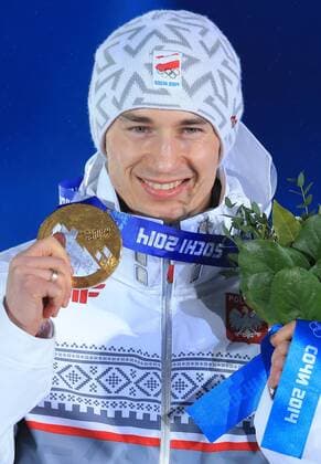 ITAR-TASS: SOCHI, RUSSIA. FEBRUARY 16, 2014. Gold medalist Zbigniew Brodka of Poland poses with his medal at a victory ceremony for the men s 1500 metres speed skating event at the Sochi 2014 Winter Olympic Games, at Medals Plaza.  premiumd Aufmacher RE139B4B