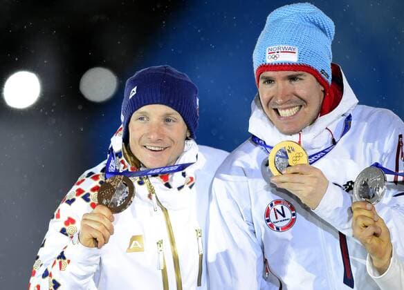 Medalists in the men s biathlon 15K mass start, left to right, Czech Republic s Ondrej Moravec, bronze, and Norway s Emil Hegle Svendsen, gold, pose with their medals at the 2014 Winter Olympics in Sochi, Russia, Tuesday, February 18, 2014. (CTKxPhoto RomanxVondrous) CTKPhotoP201402180993101