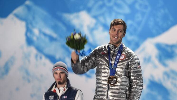 (140218) -- SOCHI, Feb. 18, 2014 (Xinhua) -- Bronze medalist Alex Deibold (front) of the US poses at the victory ceremony for men s snowboard cross at the 2014 Sochi Winter Olympic Games in Sochi, Russia, Feb. 18, 2014. (Xinhua Wang Haofei) (SP)OLY-RUSSIA-SOCHI-SNOWBOARD-MEN S SNOWBOARD CROSS 