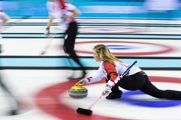 19.02.2014 Sochi, Krasnodar Krai, Russia. Canada skip Jennifer JONES delivers a stone during the semifinal of the Women s Curling competition between Great Britain and Canada from the Ice Cube Curling Centre, Coastal Clustre - XXII Olympic Winter Games xCraigxMercerx  ActionPlus0120175294