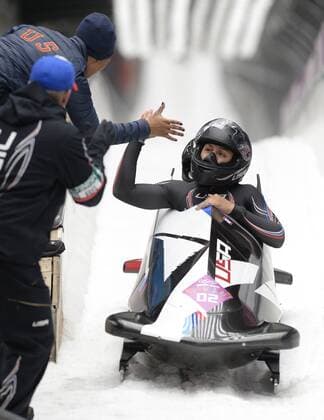 Feb. 19, 2014 - Sochi, RUS - The USA-1 Bobsled Team of Elana Meyers and Lauryn Williams celebrate their silver medal finish in the women s bobsled finals during the Winter Olympics on Wednesday, Feb. 19, 2014, in Sochi, Russia. SOCHI OLYMPIC GAMES WOMEN S BOBSLED,BOBSLEIGH - ZUMAm67