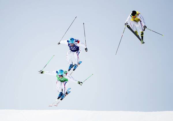 (140220) -- SOCHI, Feb. 20, 2014 (Xinhua) -- Gold medalist Jean Frederick Chaupuis (L), silver medalist Arnarud Bovolenta (C) and bronze medalist Jonathan Midol of France compete during the men s ski cross finals of freestyle skiing at the 2014 Sochi Winter Olympic Games in Sochi, Russia, Feb. 20, 2014. (Xinhua Wang Song) (SP)OLY-RUSSIA-SOCHI-FREESTYLE SKIING-MEN S SKI CROSS 