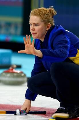(140220) -- SOCHI, Feb. 20, 2014 (Xinhua) -- Sweden s Margaretha Sigfridsson competes during the women s gold medal competition of curling event at the 2014 Sochi Winter Olympic Games in Sochi, Russia, Feb. 20, 2014. Sweden lost the game and claimed the silver medal of the event. (Xinhua Gong Bing) (SP)OLY-RUSSIA-SOCHI-CURLING-WOMEN S GOLD MEDAL-CAN VS SWE 