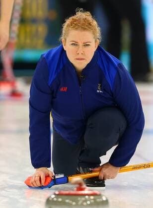 (140220) -- SOCHI, Feb. 20, 2014 (Xinhua) -- Sweden s Margaretha Sigfridsson competes during the women s gold medal competition of curling event at the 2014 Sochi Winter Olympic Games in Sochi, Russia, Feb. 20, 2014. Sweden lost the game and claimed the silver medal of the event.(Xinhua Gong Bing) (SP)OLY-RUSSIA-SOCHI-CURLING-WOMEN S GOLD MEDAL-CAN VS SWE 