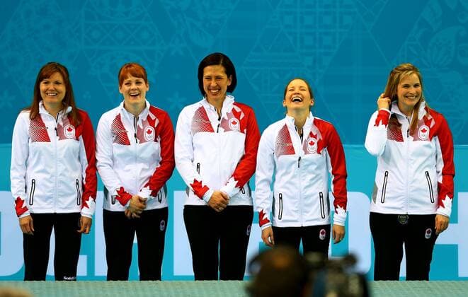 (140220) -- SOCHI, Feb. 20, 2014 (Xinhua) -- Players of Canada pose during the flower ceremony after the women s gold medal competition of curling event between Canada and Sweden at the 2014 Sochi Winter Olympic Games in Sochi, Russia, Feb. 20, 2014. Canada won 6-3 and claimed the gold medal of the event. (Xinhua Gong Bing) (SP)OLY-RUSSIA-SOCHI-CURLING-WOMEN S GOLD MEDAL-CAN VS SWE 