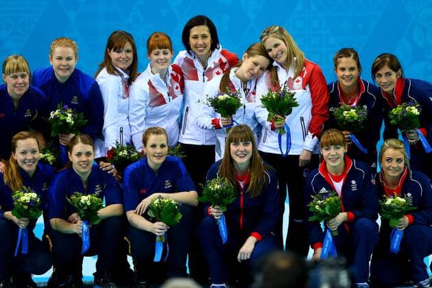 (140220) -- SOCHI, Feb. 20, 2014 (Xinhua) -- Gold medalists of Canada (C), silver medalists of Sweden (L) and bronze medalists of Great Britain pose during the flower ceremony of curling event at the 2014 Sochi Winter Olympic Games in Sochi, Russia, Feb. 20, 2014. (Xinhua Gong Bing) (SP)OLY-RUSSIA-SOCHI-CURLING-WOMEN S GOLD MEDAL-CAN VS SWE 