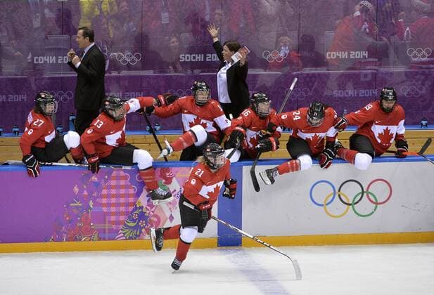 Canada celebrates after defeating the United States to win the women s ice hockey game at the Sochi 2014 Winter Olympics on February 20, 2014 in Sochi, Russia. Canada won 3-2 in overtime.  OLY20140220145