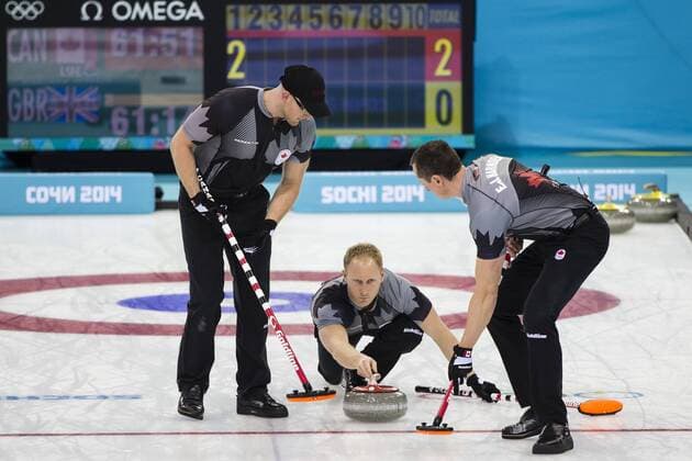 21.02.2014 Sochi, Krasnodar Krai, Russia. Canada skip Brad JACOBS delivers a stone during the Gold Medal Game of the Men s Curling competition from the Ice Cube Curling Centre, Coastal Cluster - XXII Olympic Winter Games xCraigxMercerx  ActionPlus20176878