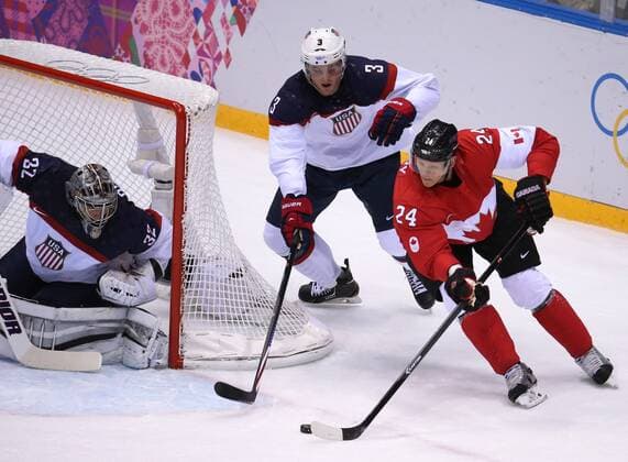 Feb. 21, 2014 - Sochi, RUS - Canada forward Corey Perry (24) attempts to score against USA goalie Jonathan Quick (32) in the first period of a men s hockey semifinal at Bolshoy Ice Dome during the Winter Olympics in Sochi, Russia, Friday, Feb. 21, 2014. USA vs Canada Hockey - ZUMAm67