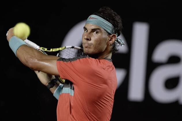 RIO DE JANEIRO, Rafael Nadal of Spain returns the during the 2014 Rio Open quarter-final match in Rio de Janeiro, Brazil, on Feb. 21, 2014. Nadal won 2-0. (Xinhua Jorge Rodrigues Eleven AGENCIA ESTADO) (vf) (sp) BRAZIL OUT (SP)BRAZIL-RIO DE JANEIRO-TENNIS-OPEN 