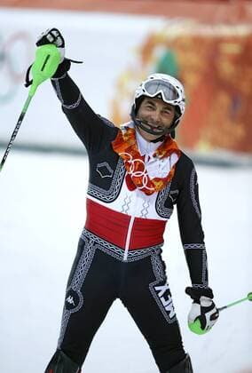 Feb. 22, 2014 - Sochi, Russia - Prince Hubertus von Hohenlohe of Mexico does a dance after crashing on his first run-of the Men s Slalom at the Rosa Khutor Alpine Center at the at the 2014 Sochi Winter Olympics. His ski suit design is fashioned after a Mexican mariachi outfit. He was the only Sochi Winter Olympics athlete from Mexico. The 55-year-old is a six-time Olympian. Men s Alpine - Sochi 2014 - ZUMAsc5