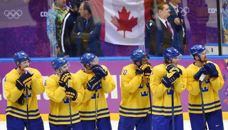 (140223) -- SOCHI, Feb. 23, 2014 (Xinhua) -- Players of Sweden react after the men s gold medal game of Ice Hockey between Sweden and Canada at the 2014 Sochi Winter Olympic Games in Sochi, Russia, Feb. 23, 2014. Sweden lost 0-3 and claimed the silver medal of the event. 