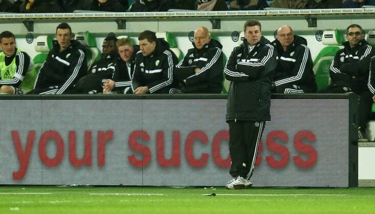 Trainer Dieter Hecking Einzelbild Aktion Werbebande your success VfL Wolfsburg Bundesliga DFL 22.02.2014 Fußball Fussball Volkswagen-Arena Wolfsburg Herren Saison 2013 2014
