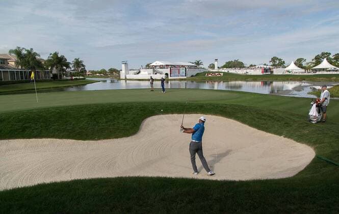 Feb. 27, 2014 - Palm Beach Gardens, FL, USA - Tiger Woods hits on to the 17th green during the first round of the Honda Classic in Palm Beach Gardens, Fla., on Thursday, Feb. 27, 2014. 2014 Honda Classic - ZUMAm67