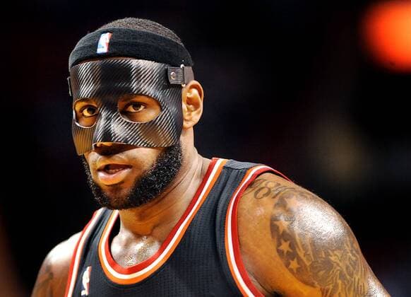 Feb. 27, 2014 - Miami, FL, USA - The Miami Heat s LeBron James wears a protective mask against the New York Knicks at the AmericanAirlines Arena in Miami on Thursday, Feb. 27, 2014. The Heat won, 108-82. New York at Miami - ZUMAm67