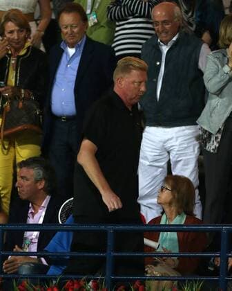 Dubai Tennis Championships 2014, ATP Tennis Herren Tennis Turnier,International Series,Dubai Tennis Stadium, U.A.E., Djokovic Trainer Boris Becker verlässt die Tribüne nach der Niederlage,Ärger, Frust,Enttäuschung,Einzelbild, Halbkörper,Hochformat,