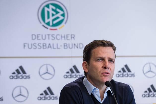 Oliver Bierhoff (Teammanager der deutschen Fussballnationalmannschaft) mit DFB Logo im Hintergrund, Portrait, Emotionen DFB Pressekonferenz mit Joachim Loew und Oliver Bierhoff, Nationalmannschaft, Fussball, 03.03.2014, EP_ANS