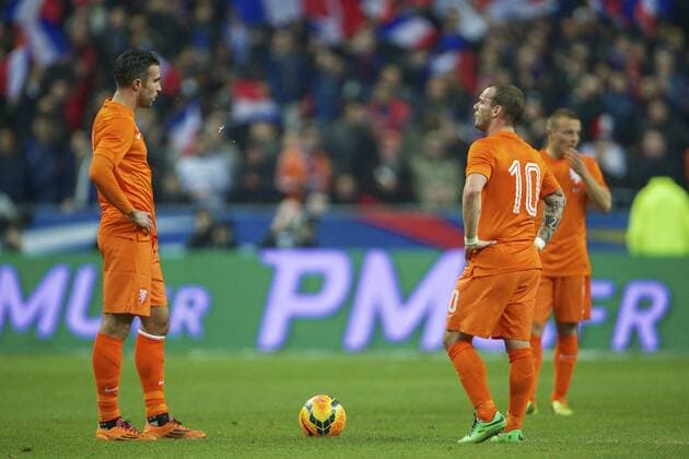 (L-R) Robin van Persie of Holland, Wesley Sneijder of Holland, Jordy Clasie of Holland during the International friendly match between France and Netherlands on March 5, 2014 at Stade France in Paris, France. France v Netherlands International Friendly 2013 2014 xVIxxIVx 2154101
