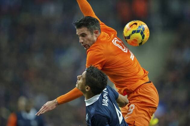 (L-R) Raphael Varane of France, Robin van Persie of Holland during the International friendly match between France and Netherlands on March 5, 2014 at Stade France in Paris, France. France v Netherlands International Friendly 2013 2014 xVIxxIVx 2154107