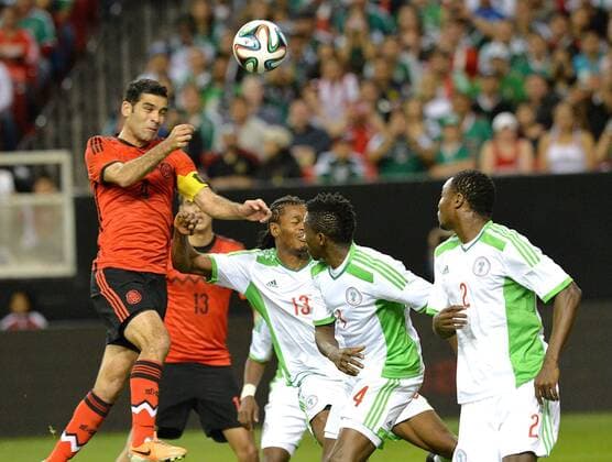 March 5, 2014 - Atlanta, GA, USA - Mexico defender Rafael Marquez (left) heads the ball against the Nigeria during an international friendly soccer match at the Georgia Dorm in Atlanta on Wednesday, March 5, 2014. Nigeria vs. Mexico - ZUMAm67