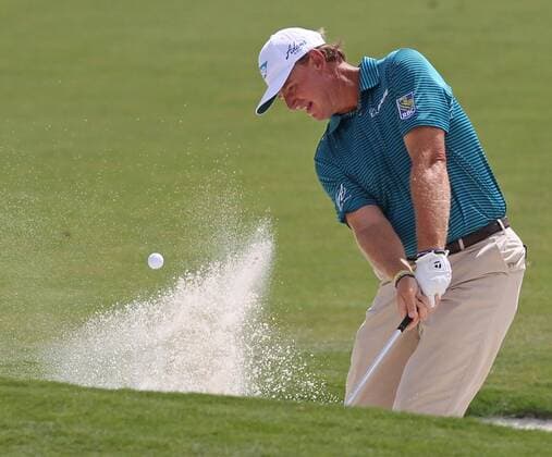 March 6, 2014 - Doral, FL, USA - Ernie Els hits out of a bunker at the first hole during the first round of the WGC-Cadillac Championship at Trump National Doral in Doral, Fla., on Thursday, March 6, 2014. WGC-Cadillac Championship - ZUMAm67