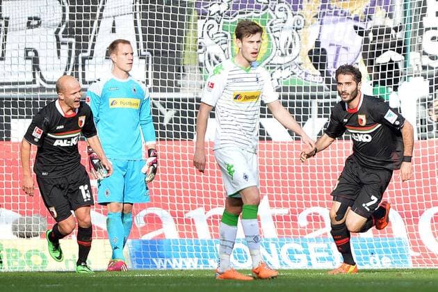 Borussia Mönchengladbach vs. FC Augsburg --- Fussball --- 1.Bundesliga --- 08.03.2014 Torjubel nach dem 1:1, von links: Tobias Werner (Augsburg), Marc-Andre ter Stegen (Mönchengladbach), Havard Nordtveit (Mönchengladbach), Torschütze Halil Altintop (Augsburg), Freude, Enttäuschung, Freisteller