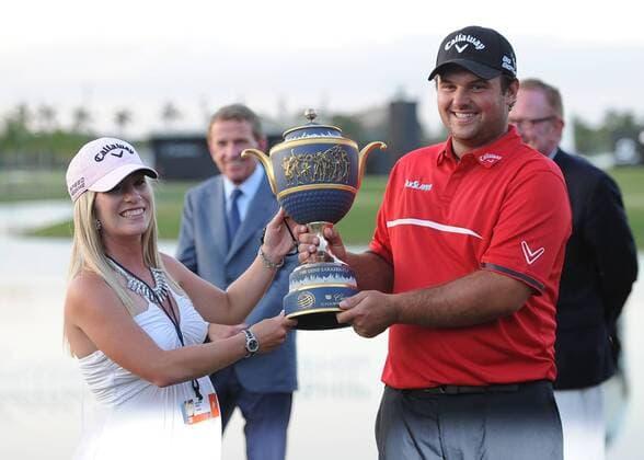 March 09, 2014, Patrick Reed and wife Justine hold the Trophy after winning the PGA Golf Herren - World Golf Championship - Final Round at Trump National Doral in Doral, Florida GOLF: MAR 09 PGA Golf Herren - World Golf Championships-Cadillac Championship - Final Round Icon20180940 EDITORIAL USE ONLY