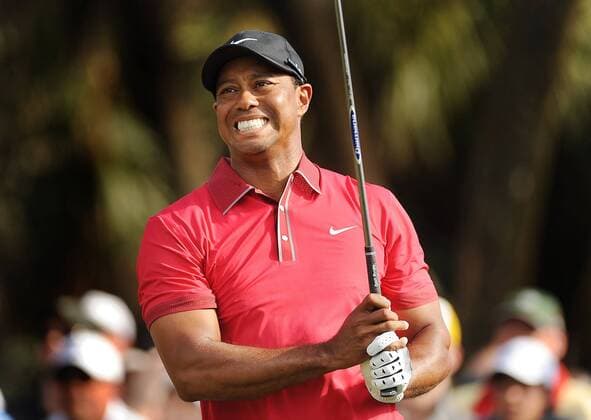 March 9, 2014 - Doral, FL, USA - Tiger Woods grimaces as he follows through on his tee shot on the 12th hole during the final round of the WGC-Cadillac Championship at Trump National Doral on Sunday, March 9, 2014, in Doral, Fla. WGC-Cadillac Championship - ZUMAm67