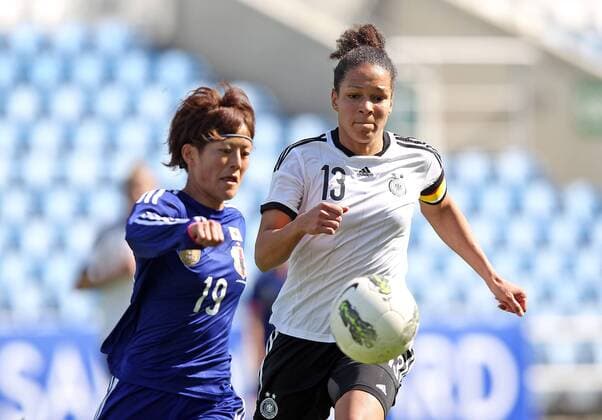 Fussball, Algarve Cup 2014, Deutschland - Japan, v.li.: Saori Ariyoshi (Japan), Celia Okoyino Sasic (Deutschland), im Zweikampf, Duell, duel, tackle, Aktion, Action xmrx