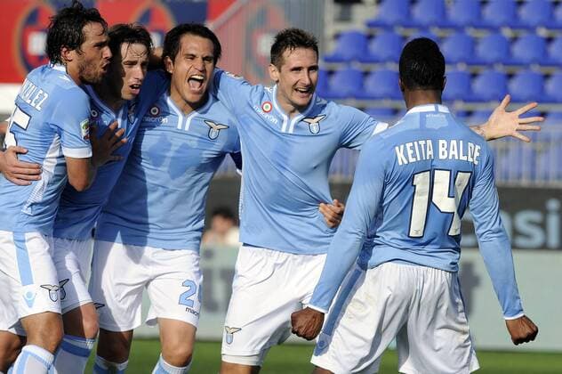 Jubel Keita Balde (R) Lazio, Alvaro Gonzalez, Lucas Biglia, Cristian Ledesma, Miroslav Klose 0-2 Goal celebration Cagliari 16-03-2014 Stadio Sant Elia - Football 2013 2014 Serie A. Cagliari Calcio vs Lazio Rom fnozxinside