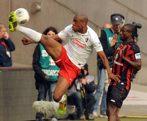 Eintracht Frankfurt vs. SC Freiburg Frankfurt a. M.,Commerzbank-Arena, 16.3.2014 Fußball, 1. Bl, Saison 2013-2014 Gelson FERNANDES, SC Freiburg und Constant DJAKPA, Eintracht Frankfurt. Foto und alle