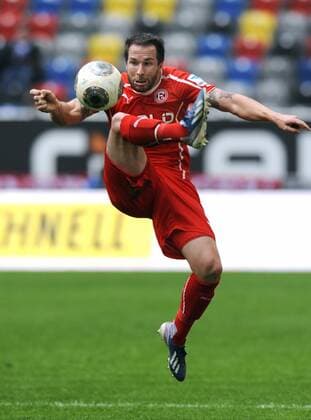 Fussball, 2. Bundesliga, Deutschland, Herren, Saison 2013 2014, 25. Spieltag, ESPRIT-Arena Düsseldorf, Fortuna Düsseldorf, Duesseldorf, F95 (rot) - FC St. Pauli (weiss) 0:2; Christian Weber (Düsseldorf). Aktion, Einzelbild.
