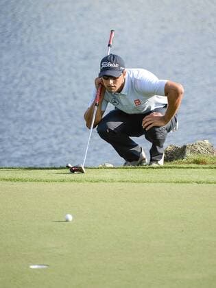 March 21, 2014 - Orlando, FL, U.S: Adam Scott lines up his par putt on the 18th green during second round golf action of the Arnold Palmer Invitational presented by Mastercard held at Arnold Palmer s Bay Hill Club & Lodge in Orlando, FL PGA Golf Herren 2014: Arnold Palmer Invitational MAR 21 - ZUMAcg2