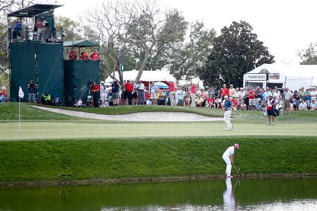 March 21, 2014 - Orlando, Florida, U.S - Rickie Fowler hits a shot on to the 8th green during the second round of the Arnold Palmer Invitational presented by MasterCard held at Arnold Palmer s Bay Hill Club and Lodge. Golf 2014 - Arnold Palmer Invitational - Round 2 - ZUMAw10