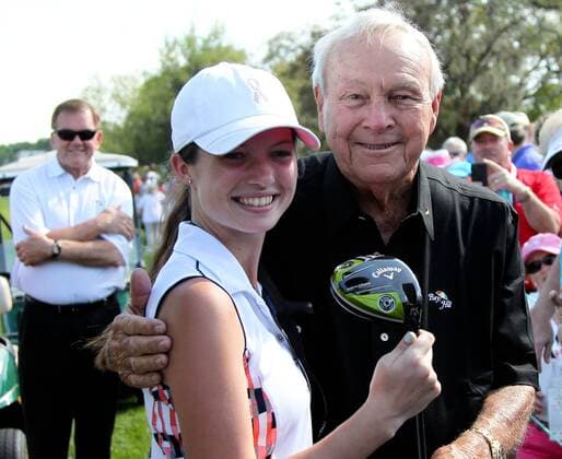 March 22, 2014 - Orlando, Florida, U.S - Arnold Palmer (R) poses for pictures after he autographs a driver for Catherine Yaun (L) on the 18th fairway as former 1st Secretary of Homeland Security looks on during the third round of the Arnold Palmer Invitational presented by MasterCard held at Arnold Palmer s Bay Hill Club and Lodge. Golf 2014 - Arnold Palmer Invitational - Round 3 - ZUMAw10