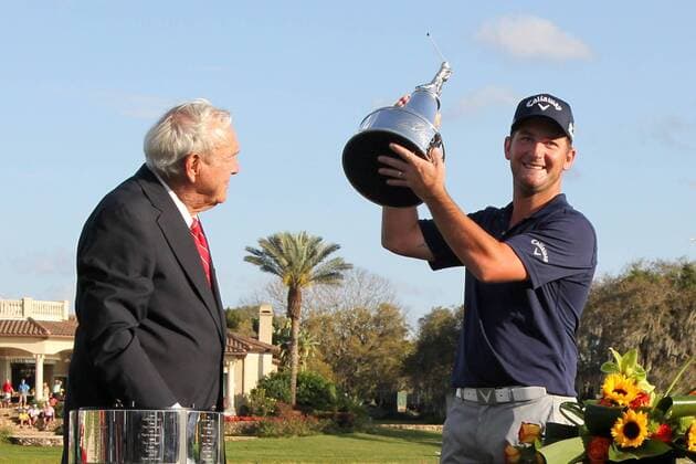 March 23, 2014 - Orlando, Florida, U.S - As Arnold Palmer looks on, Matt Every (R) holds the trophy after winning the Arnold Palmer Invitational presented by MasterCard held at Arnold Palmer s Bay Hill Club and Lodge. Golf 2014 - Arnold Palmer Invitational - Final Round - ZUMAw10