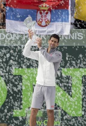 March 30, 2014 - Key Biscayne, Florida, USA - Key Biscayne - March 30: NOVAK DJOKOVIC(SRB) receives his Champions trophy Tennis - Sony Open Tennis - ATP Tennis Herren World Tour Masters 1000 - Men s Championship - Day 14 - Sunday 30th March 2014 - Tennis Center at Crandon Park Key Biscayne, Miami, Florida USA - ZUMApa3