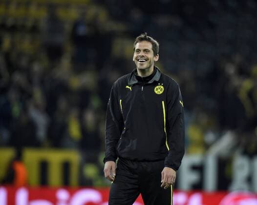 19.03.2014, Fussball Champions-League 2013 2014 Achtelfinale Rückspiel, Borussia Dortmund - Zenit St. Petersburg, im Signal-Iduna-Park-Stadion Dortmund, Manuel Friedrich (Dortmund) lacht beim Aufwärmen. 
