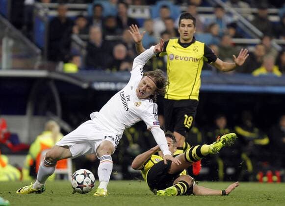 Soccer match between Real Madrid and Borussia Dortmund of the Champions League, held at the Santiago Bernabeu stadium, in Madrid 04 02 2014. Luca Modric 