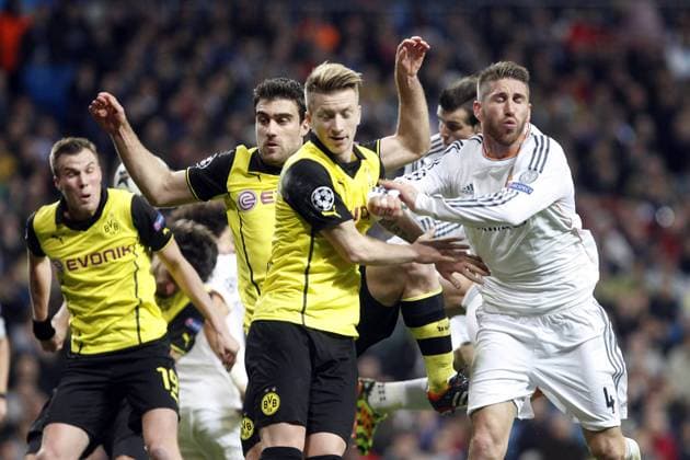 Real Madrid s Sergio RamosMrco Reus and Borussia Dortmund s during Champions League soccer match at Santiago Bernabeu stadium in Madrid, Spain. April 02, 2014.  (20140402278)