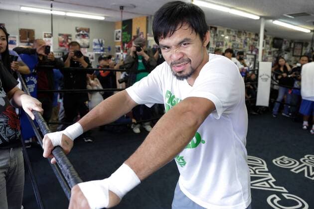 April 2, 2014 - Los Angeles, CA, U.S - Manny Pacman Pacquiao poses for a photograph at the Wildcard Boxing Gym on April 2, 2014 in Los Angeles, California. WBO Welterweight Title on April 12 at the MGM Grand in Las Vegas. - ZUMAy20