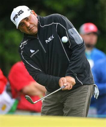 April 8, 2014 - Augusta, GA, USA - The 2009 Masters champion Angel Cabrera, who finished second to Adam Scott in the 2013 Masters in a sudden-death playoff, chips to the first green during his practice round at Augusta National Golf Club on Tuesday, April 8, 2014, in Augusta, Ga. PGA - ZUMAm67