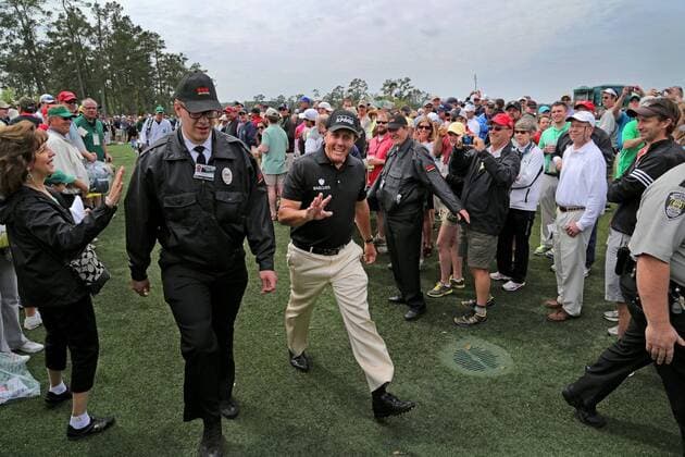 April 8, 2014 - Augusta, GA, USA - Phil Mickelson waves at patrons after finishing up during a practice round at Augusta National Golf Club on Tuesday, April 8, 2014, in Augusta, Ga. PGA - ZUMAm67