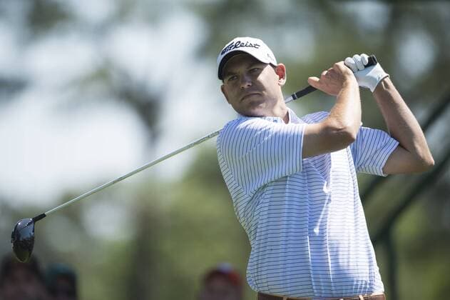 Bill Hass watches his drive from the 18th tee during the first round of the 2014 Masters Tournament at Augusta National Golf Club in Augusta, Georgia, April 10, 2014.  AUG20140410368