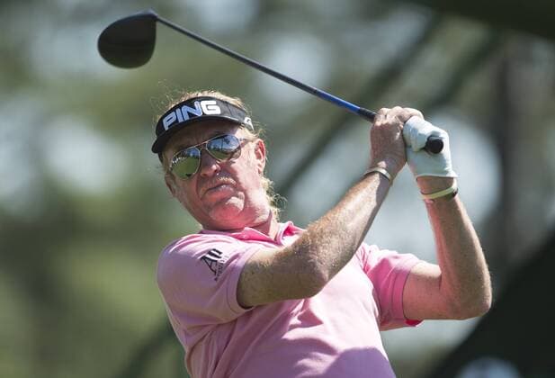 Miguel Angel Jimenez watches his drive off of the 18th tee during the first round of the 2014 Masters Tournament at Augusta National Golf Club in Augusta, Georgia, April 10, 2014.  AUG20140410369