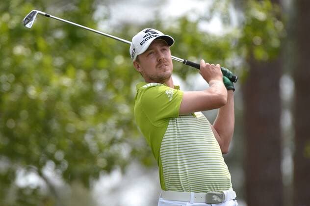 Jonas Blixt watches his drive off of the 4th tee during the second round of the 2014 Masters Tournament at Augusta National Golf Club in Augusta, Georgia, April 11, 2014. Watson finished seven under par.  AUG20140411317