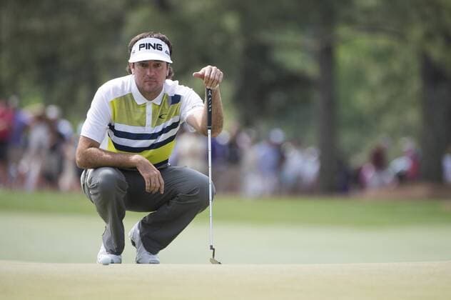 Bubba Watson lines up a putt on the 17th green during the second round of the 2014 Masters Tournament at Augusta National Golf Club in Augusta, Georgia, April 11, 2014. Watson finished seven under par.  AUG20140411325